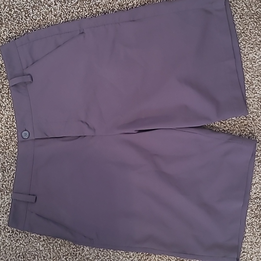 Puma 9" solid color golf shorts in dark grey